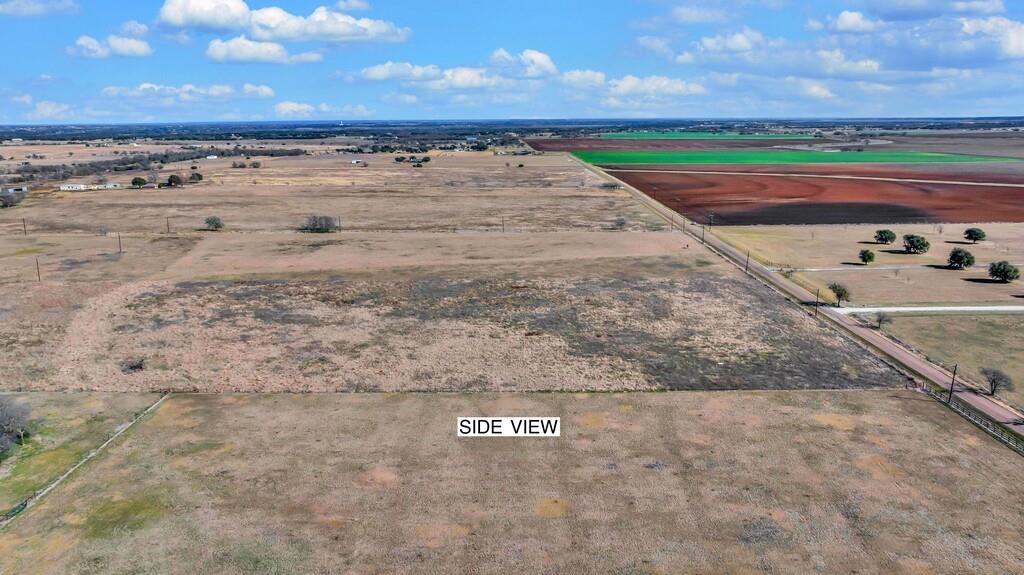 2158 Old Crawford Road Crawford, TX 76638 - Photo 12 of 14 a view of a dry yard with wooden fence
