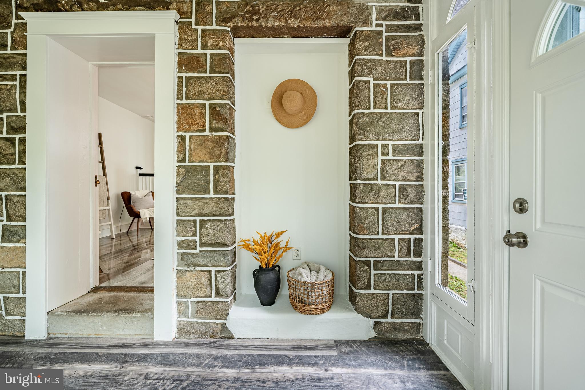 240 Ballymore Road Springfield, PA 19064 - Photo 18 of 33 a view of a door with wooden floor and a window