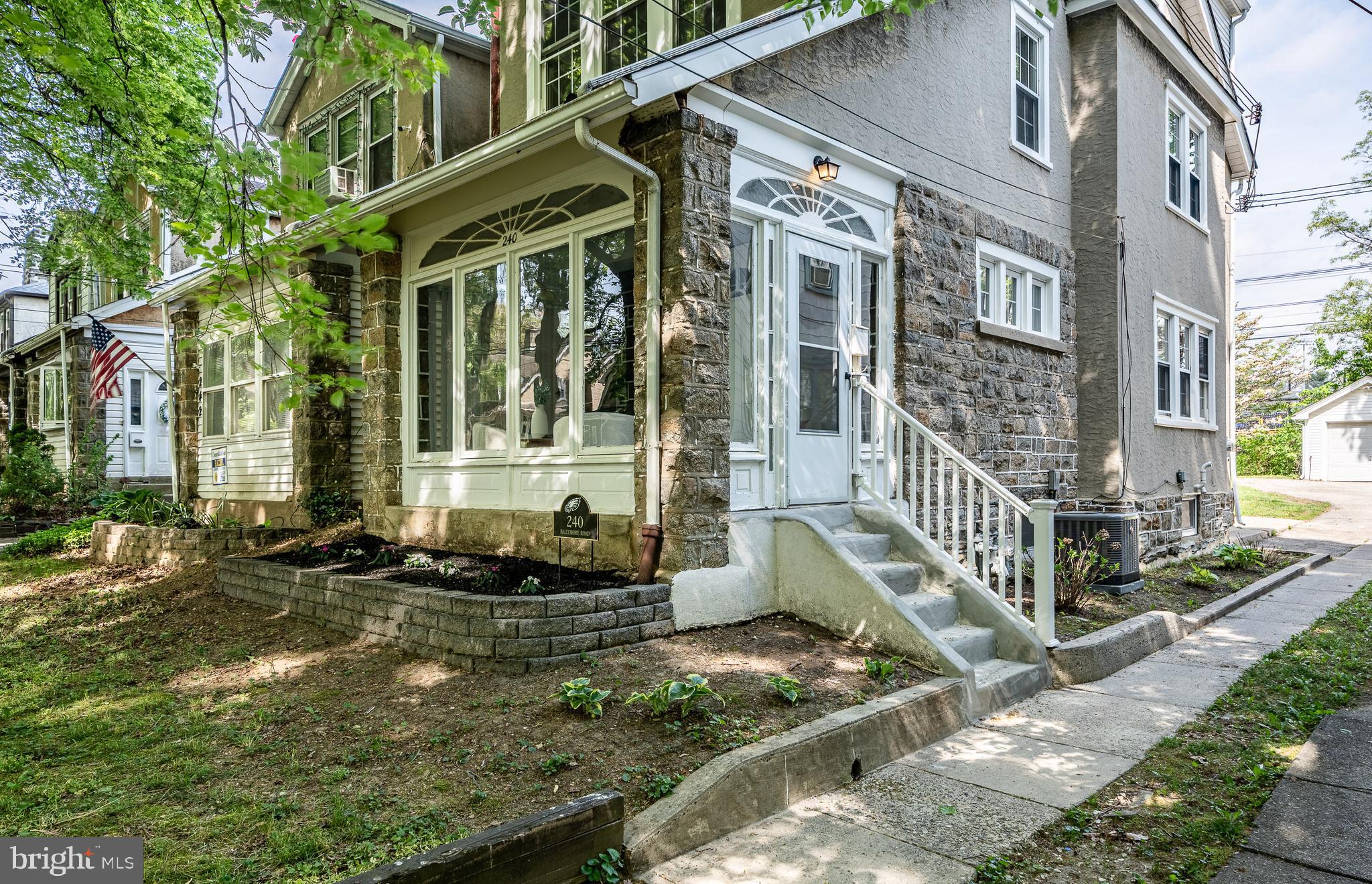 240 Ballymore Road Springfield, PA 19064 - Photo 2 of 33 a front view of a house with a yard