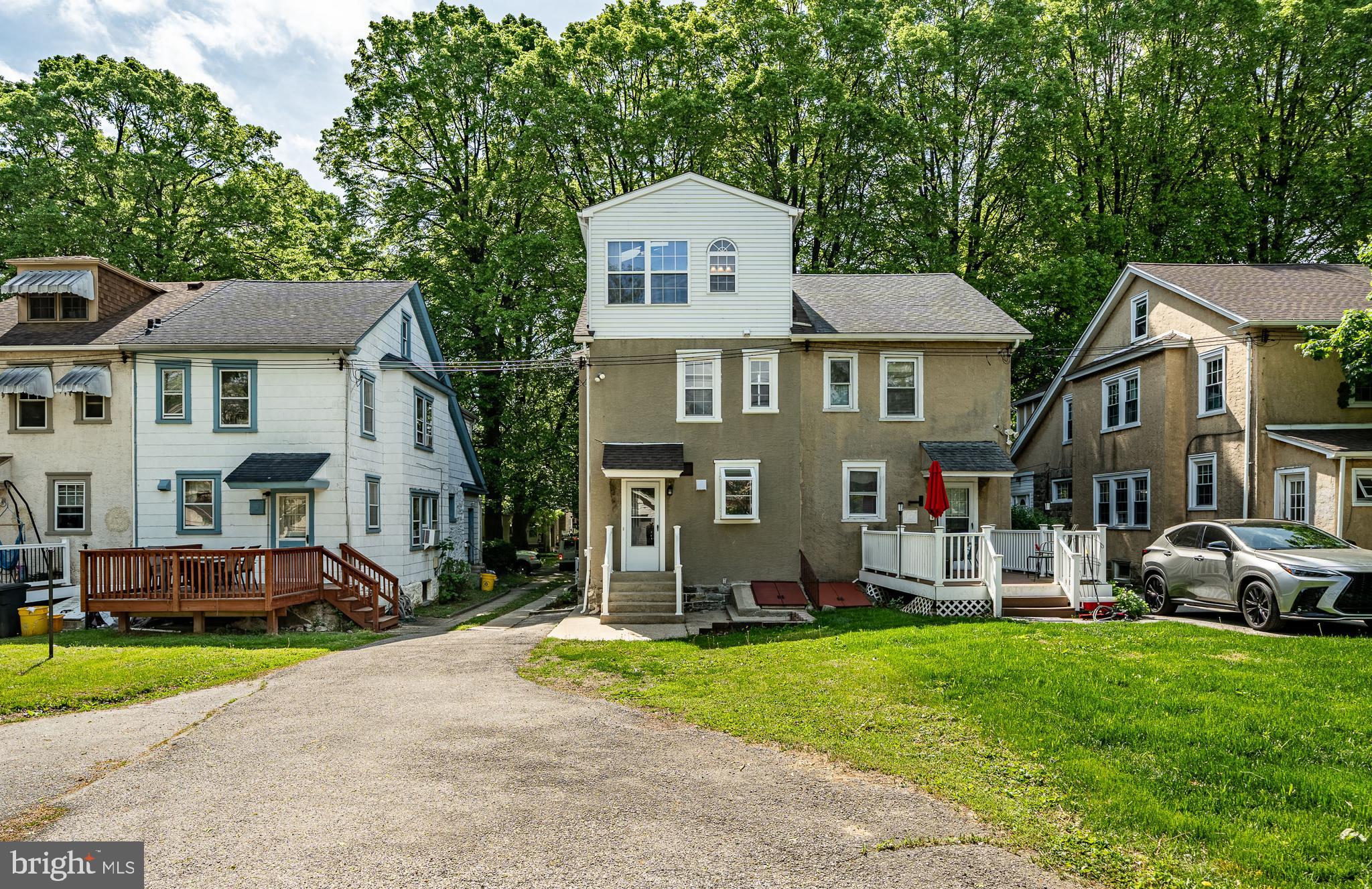 240 Ballymore Road Springfield, PA 19064 - Photo 25 of 33 a front view of a house with a garden