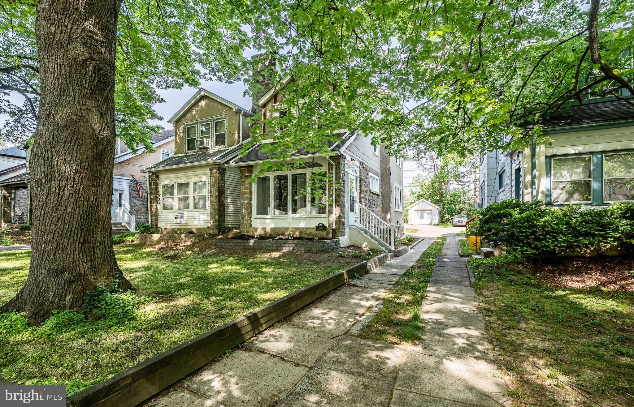 240 Ballymore Road Springfield, PA 19064 - Photo 26 of 33 a front view of a house with garden