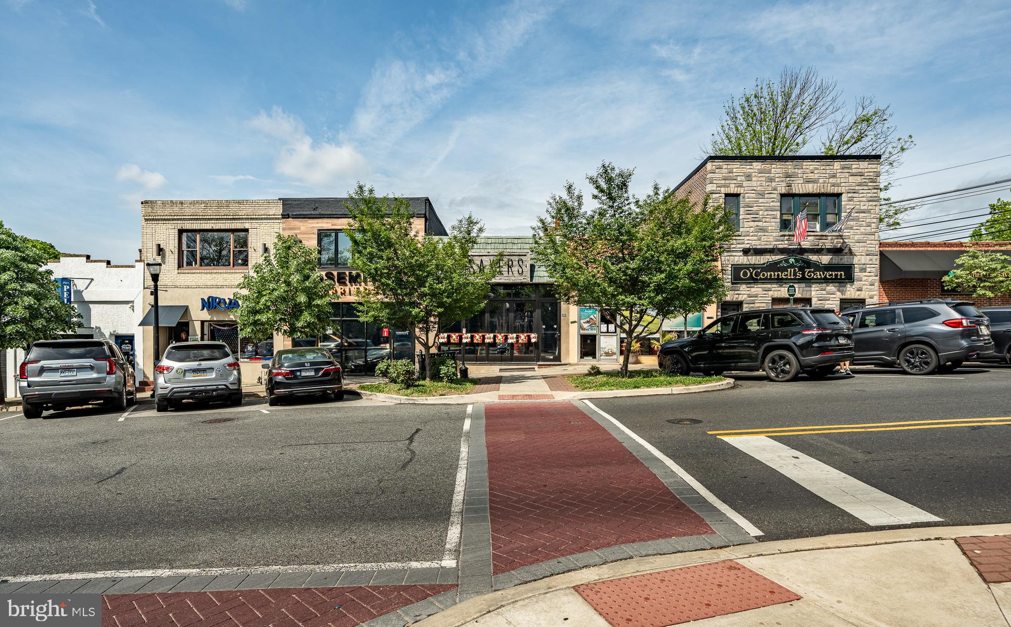240 Ballymore Road Springfield, PA 19064 - Photo 29 of 33 a view of a street with cars on road