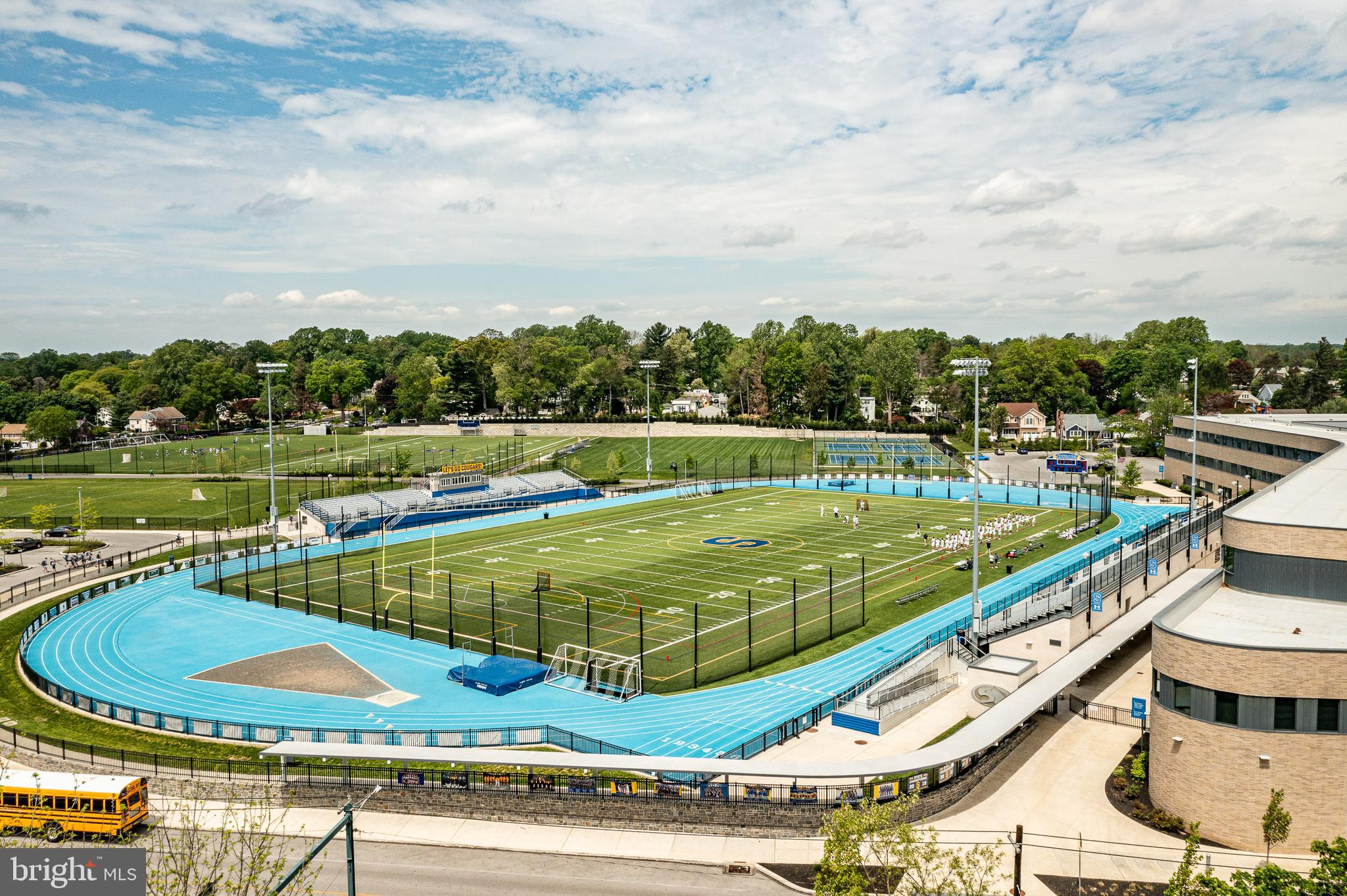 240 Ballymore Road Springfield, PA 19064 - Photo 32 of 33 a view of a swimming pool with a garden and seating