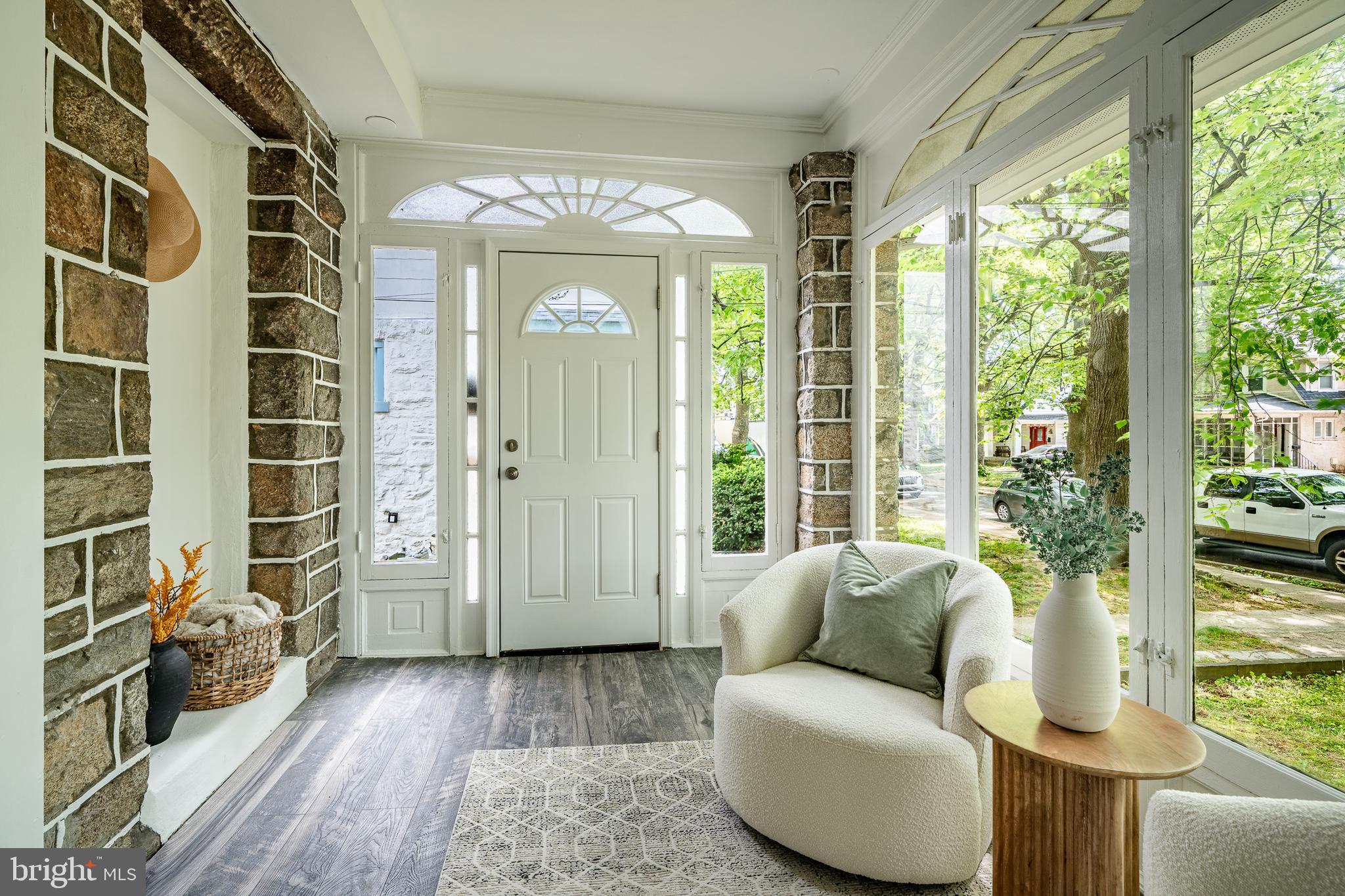 240 Ballymore Road Springfield, PA 19064 - Photo 6 of 33 a living room with furniture and a large window