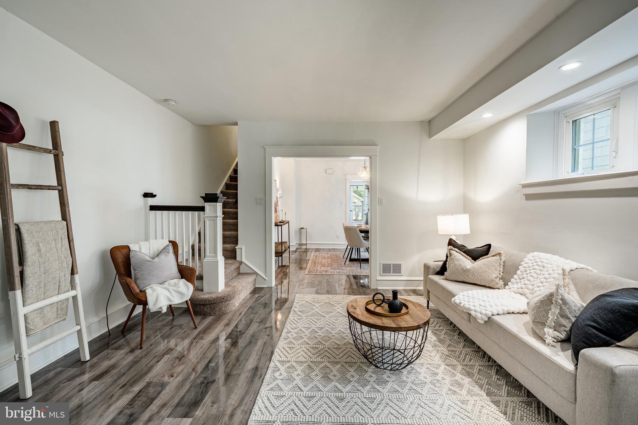 240 Ballymore Road Springfield, PA 19064 - Photo 7 of 33 a living room with furniture and a large window