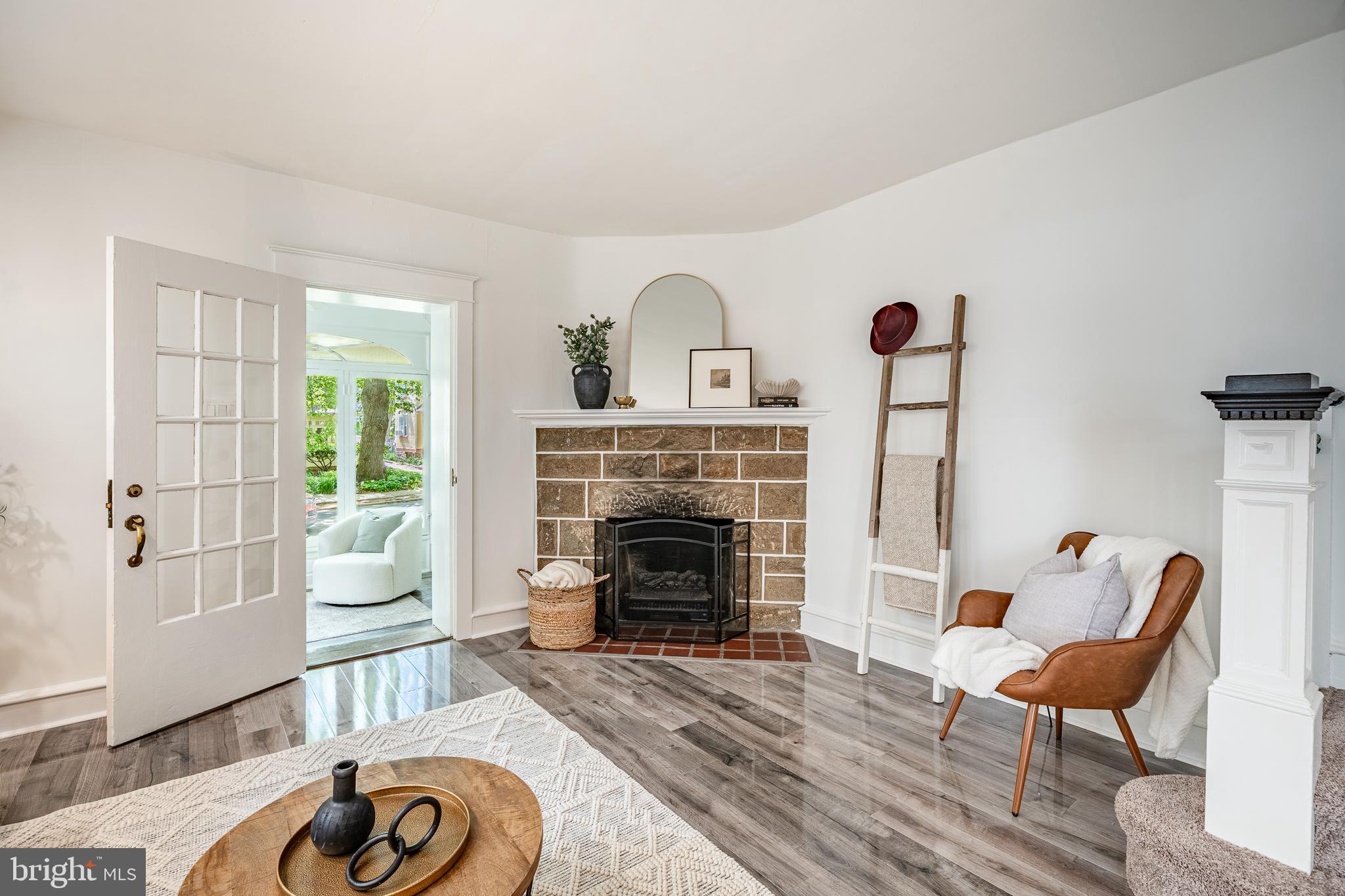 240 Ballymore Road Springfield, PA 19064 - Photo 9 of 33 a living room with furniture and a fireplace