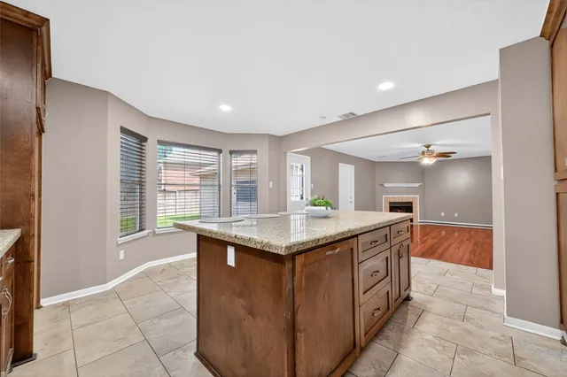 a kitchen with a stove and a sink