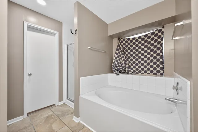 a bathroom with a bathtub