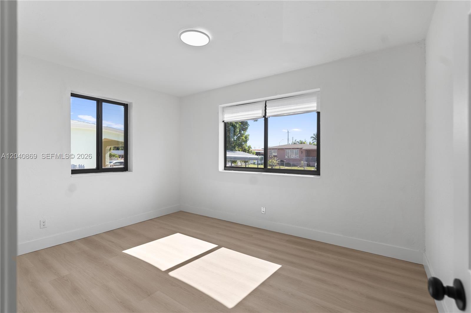 31 West 64th Street Hialeah, FL 33012 - Photo 35 of 49 an empty room with a window
