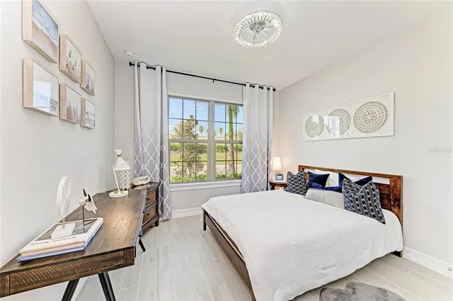 a living room with furniture a patio and a table