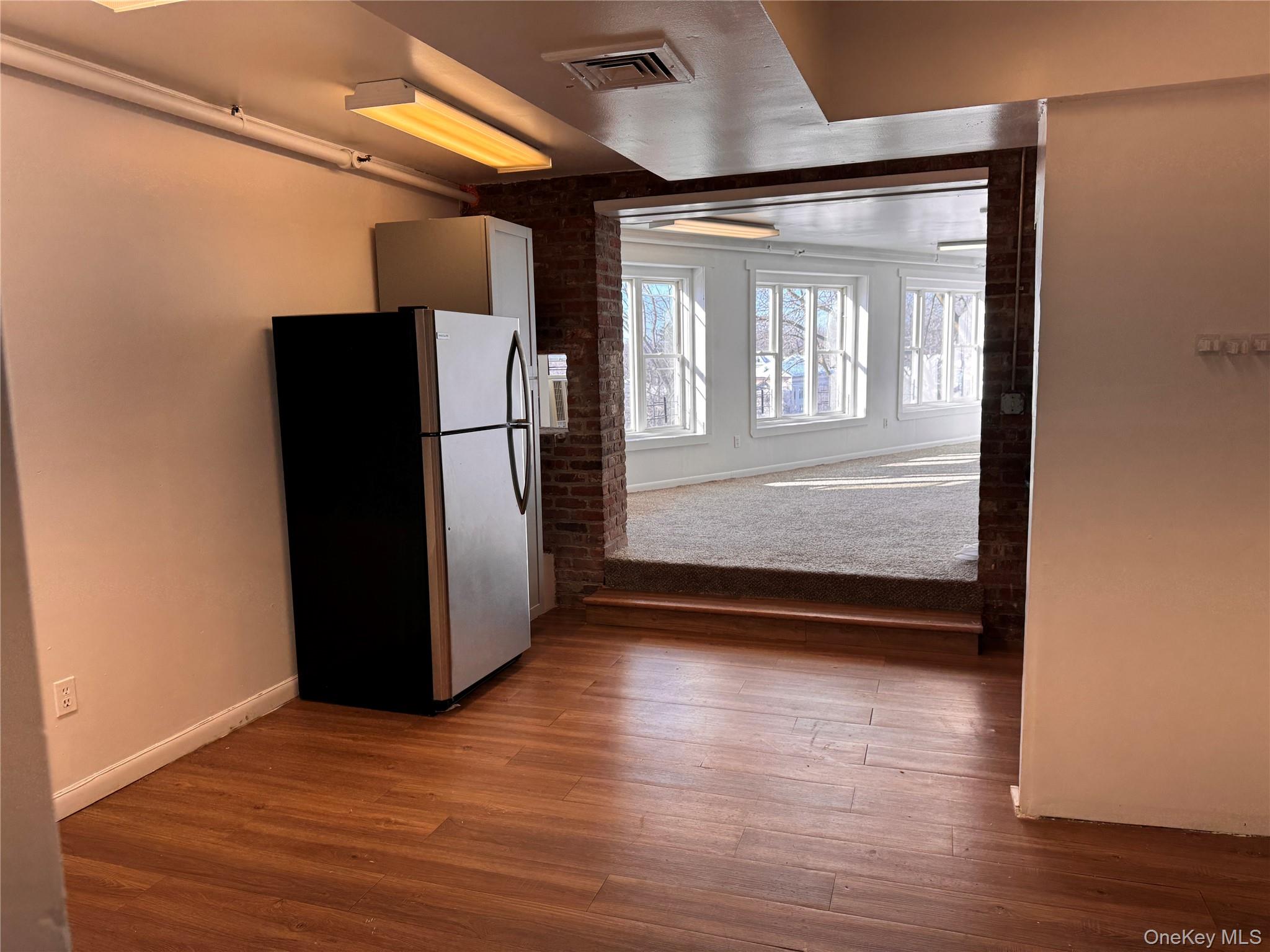 From entry looking into kitchen and living space.