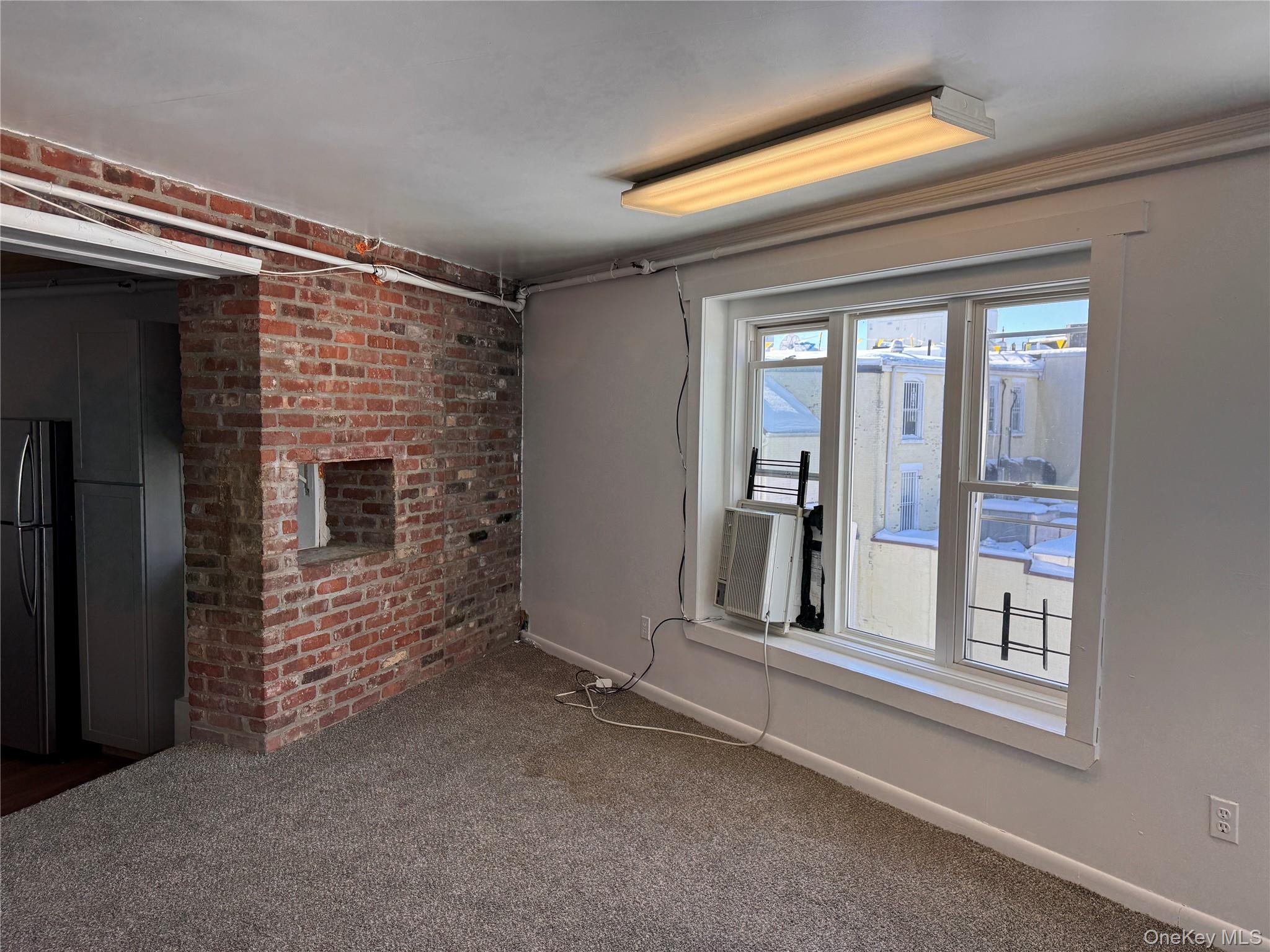 175 Main Street, Unit 2R Ossining, NY 10562 - Photo 16 of 22 Window air conditioner.