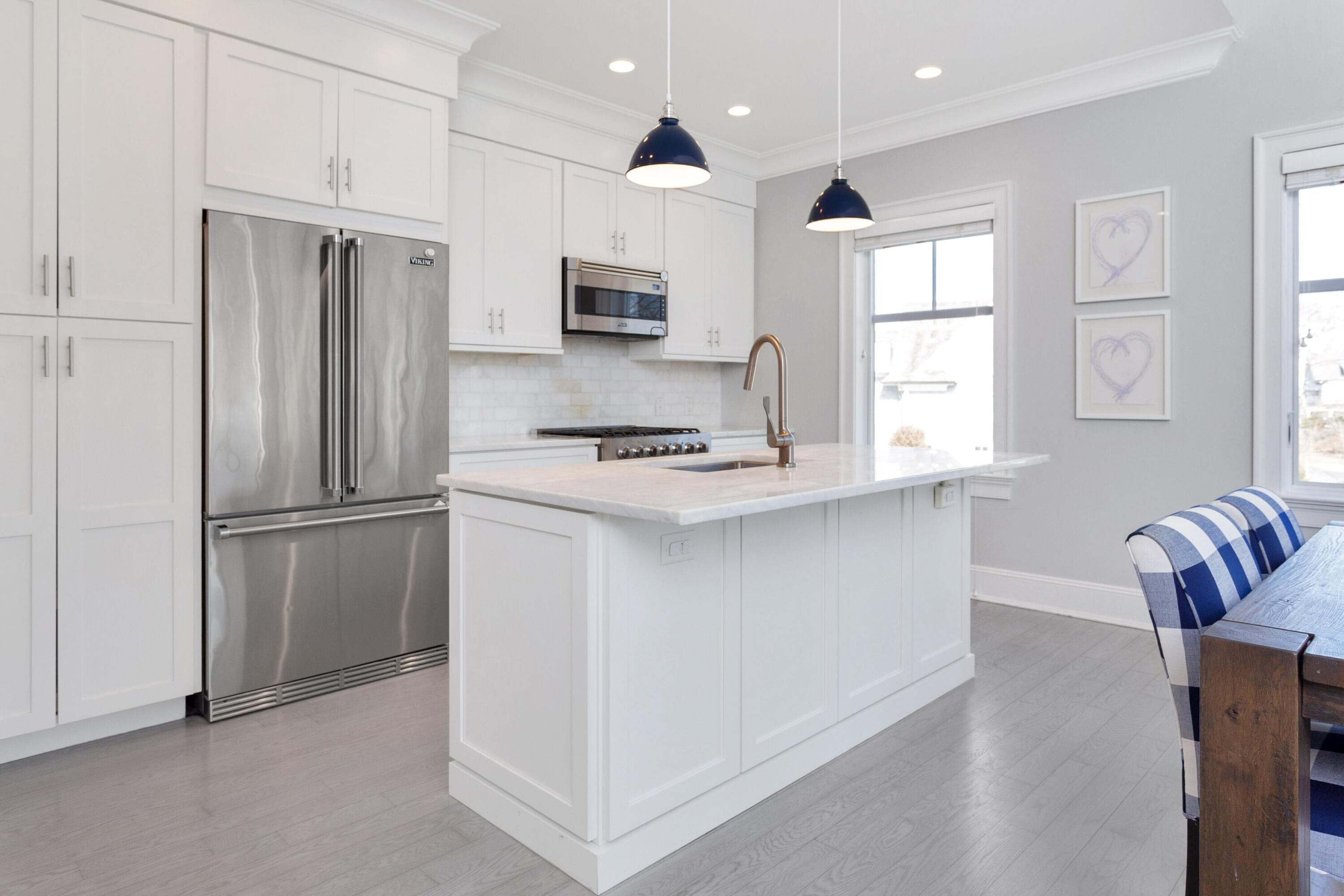 71 Rowayton Avenue, Unit 7 Rowayton, CT 06853 - Photo 13 of 31 a kitchen with stainless steel appliances granite countertop a refrigerator a stove a sink and a microwave