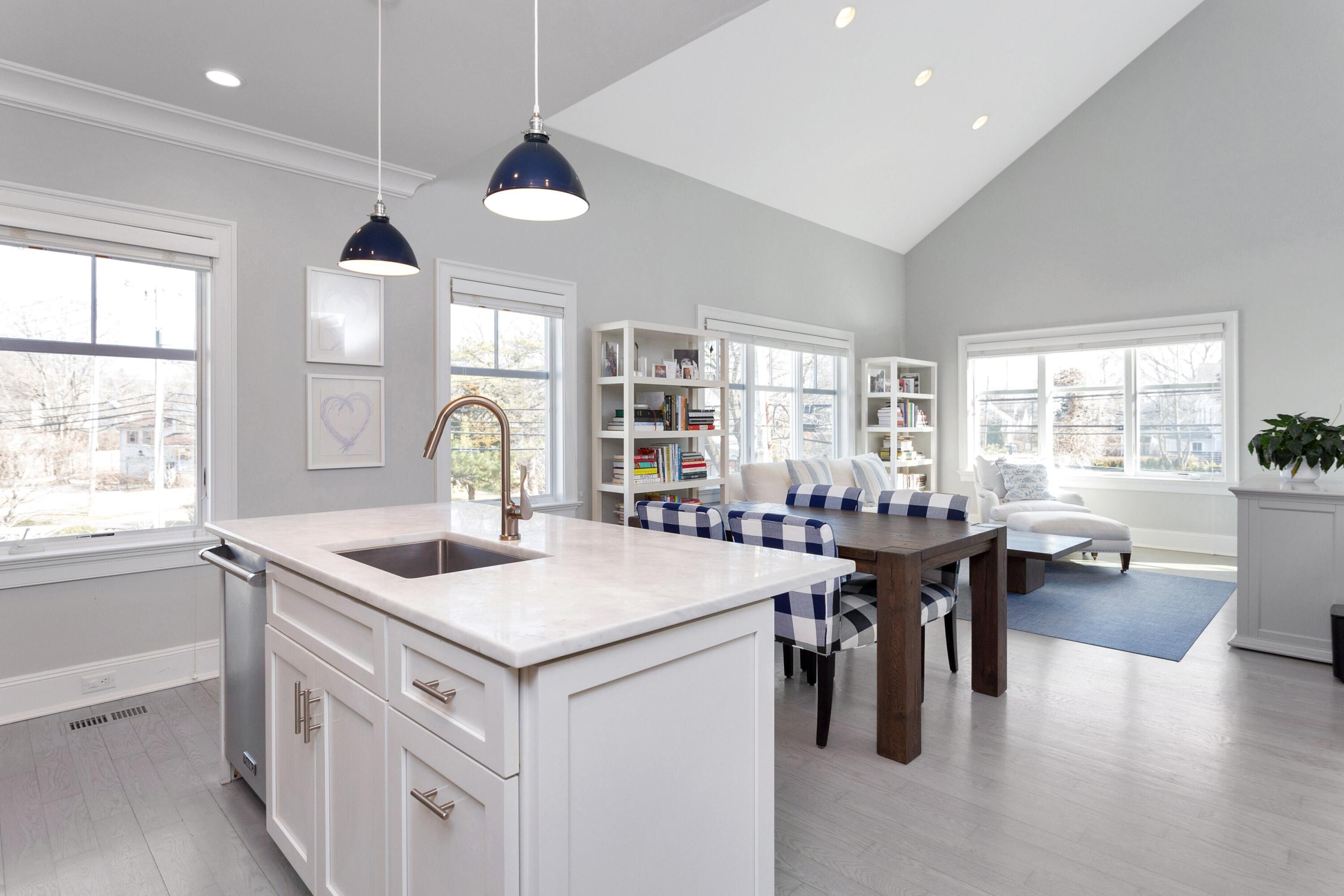 71 Rowayton Avenue, Unit 7 Rowayton, CT 06853 - Photo 15 of 31 a kitchen with a stove a table and chairs