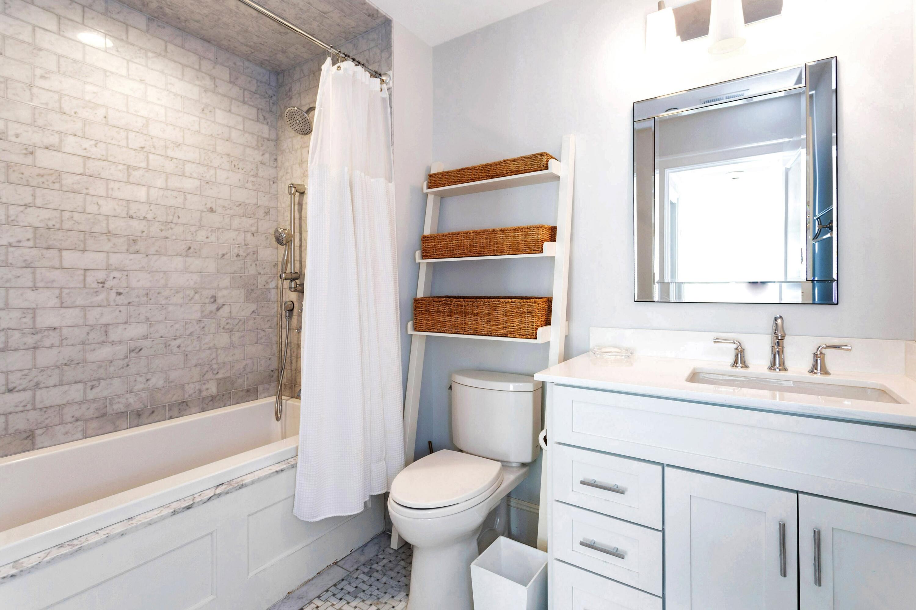 71 Rowayton Avenue, Unit 7 Rowayton, CT 06853 - Photo 19 of 31 a bathroom with a sink toilet and shower