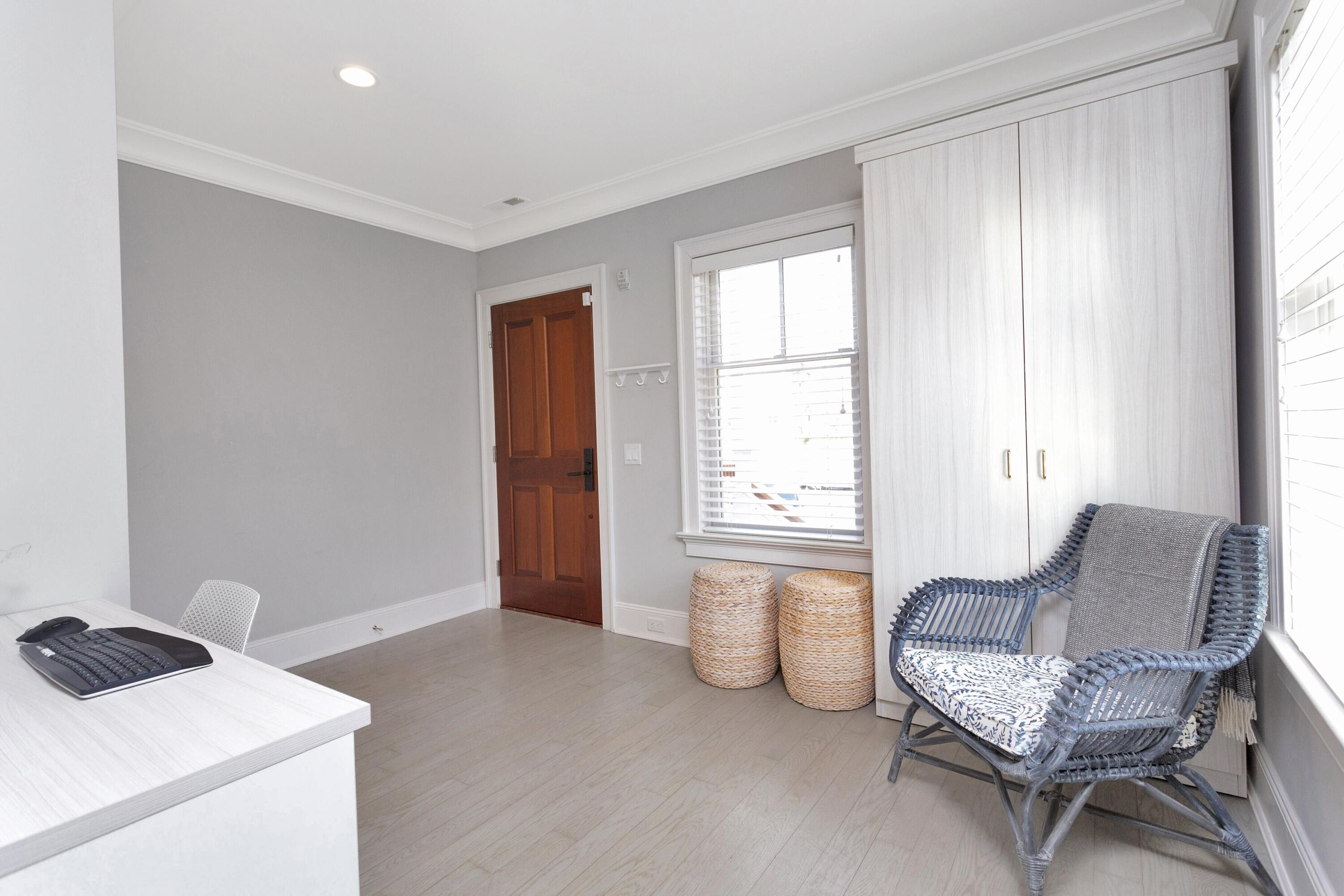 71 Rowayton Avenue, Unit 7 Rowayton, CT 06853 - Photo 25 of 31 a living room with furniture and a window