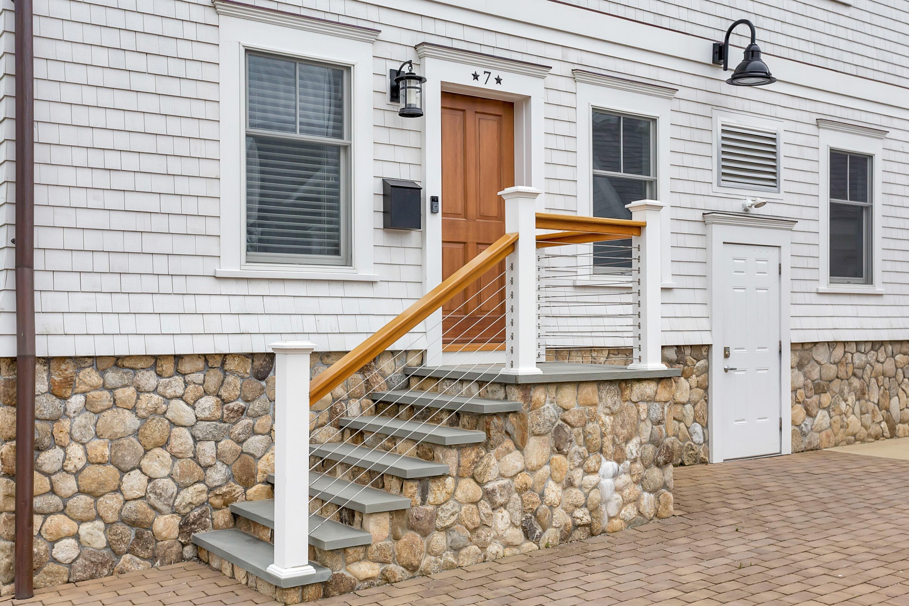 71 Rowayton Avenue, Unit 7 Rowayton, CT 06853 - Photo 31 of 31 a view of a house with wooden stairs