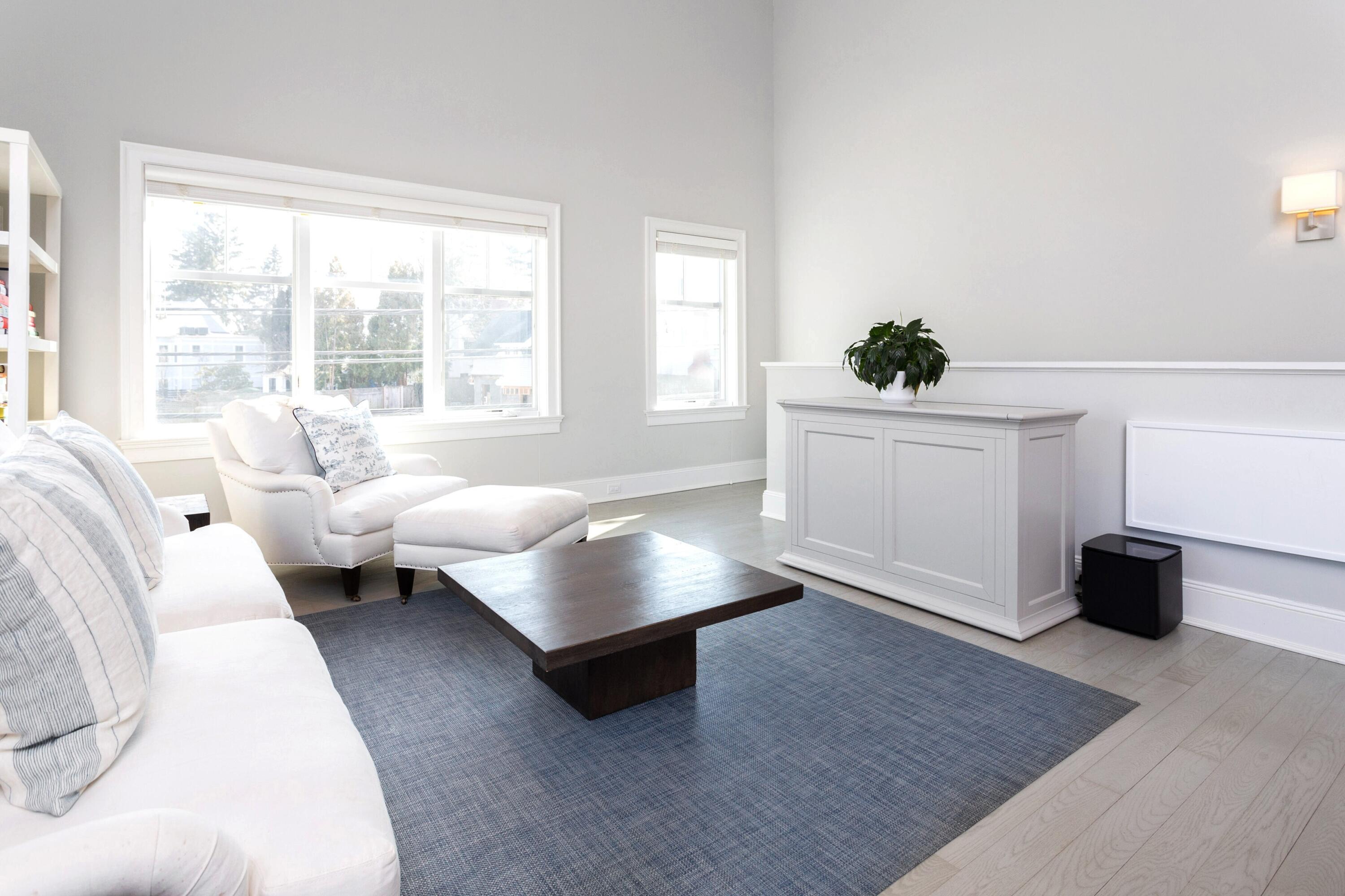 71 Rowayton Avenue, Unit 7 Rowayton, CT 06853 - Photo 6 of 31 a living room with furniture and a potted plant