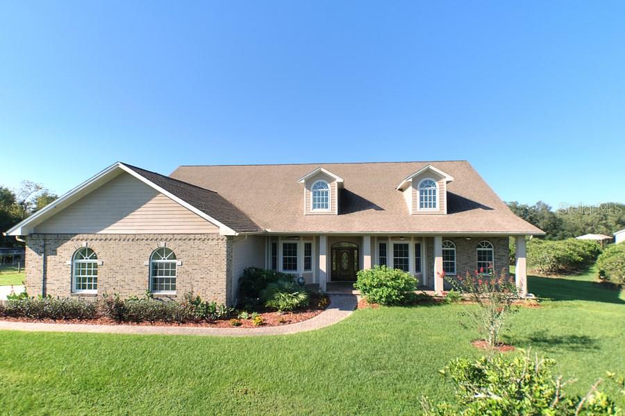 17114 Boy Scout Road Odessa, FL 33556 - Photo 1 of 1 Charming Elevation with front porch
