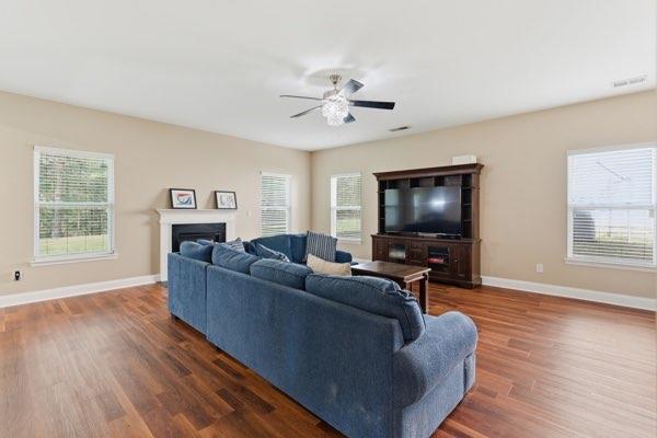 4925 Locherby Drive Fairburn, GA 30213 - Photo 30 of 85 a living room with furniture and a flat screen tv