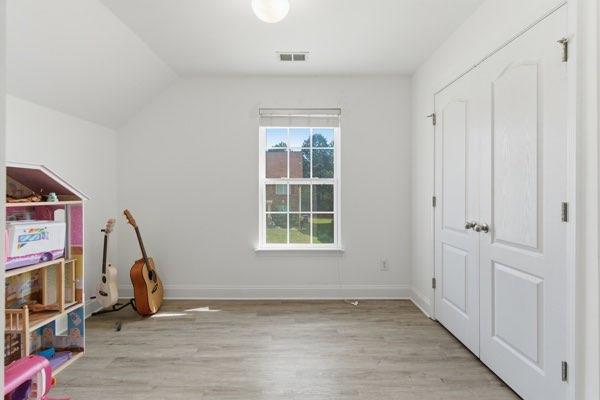 4925 Locherby Drive Fairburn, GA 30213 - Photo 38 of 85 a view of empty room with wooden floor and fan