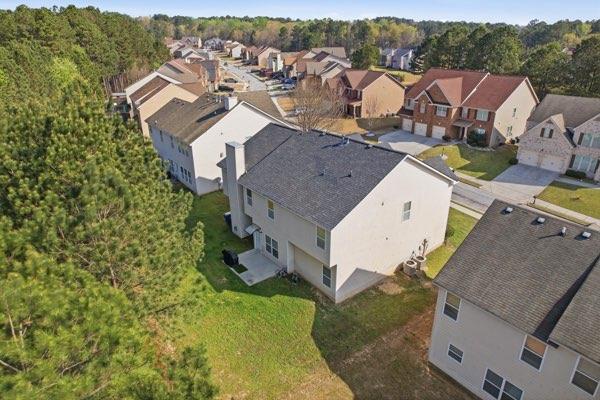 4925 Locherby Drive Fairburn, GA 30213 - Photo 51 of 85 an aerial view of a house with a yard