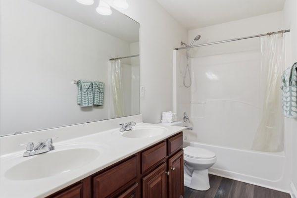 4925 Locherby Drive Fairburn, GA 30213 - Photo 53 of 85 a bathroom with a sink toilet and shower
