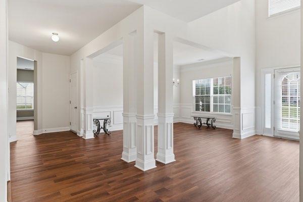 4925 Locherby Drive Fairburn, GA 30213 - Photo 9 of 85 a view of a livingroom with wooden floor and a couch