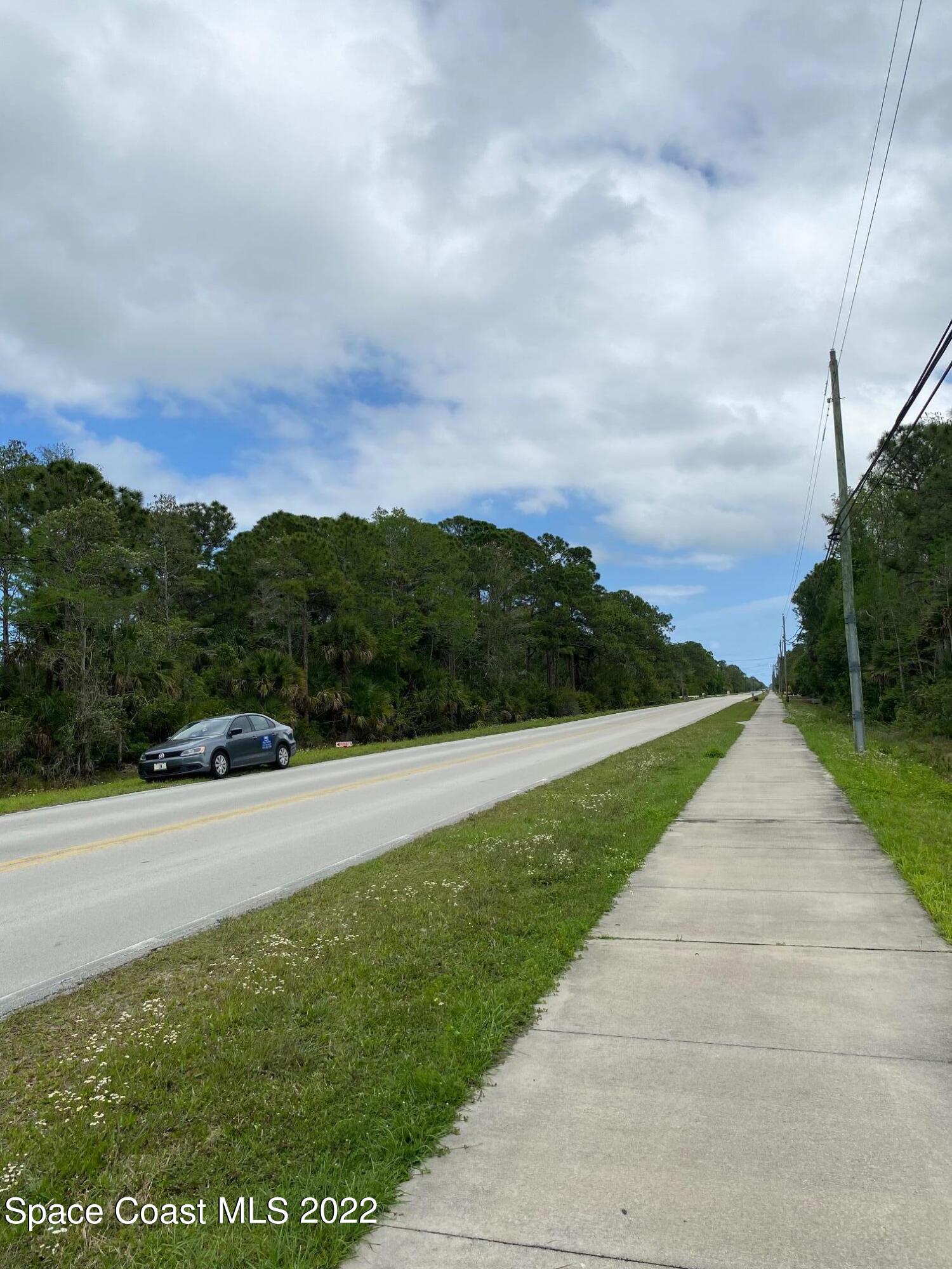 0 Vacant Road Grant Valkaria, FL 32949 - Photo 2 of 7 a view of a street