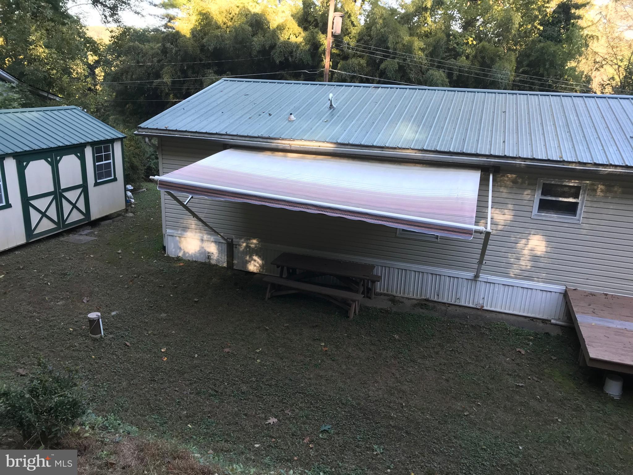 31 Irwin Road Airville, PA 17302 - Photo 7 of 35 Roll out awning at rear of house