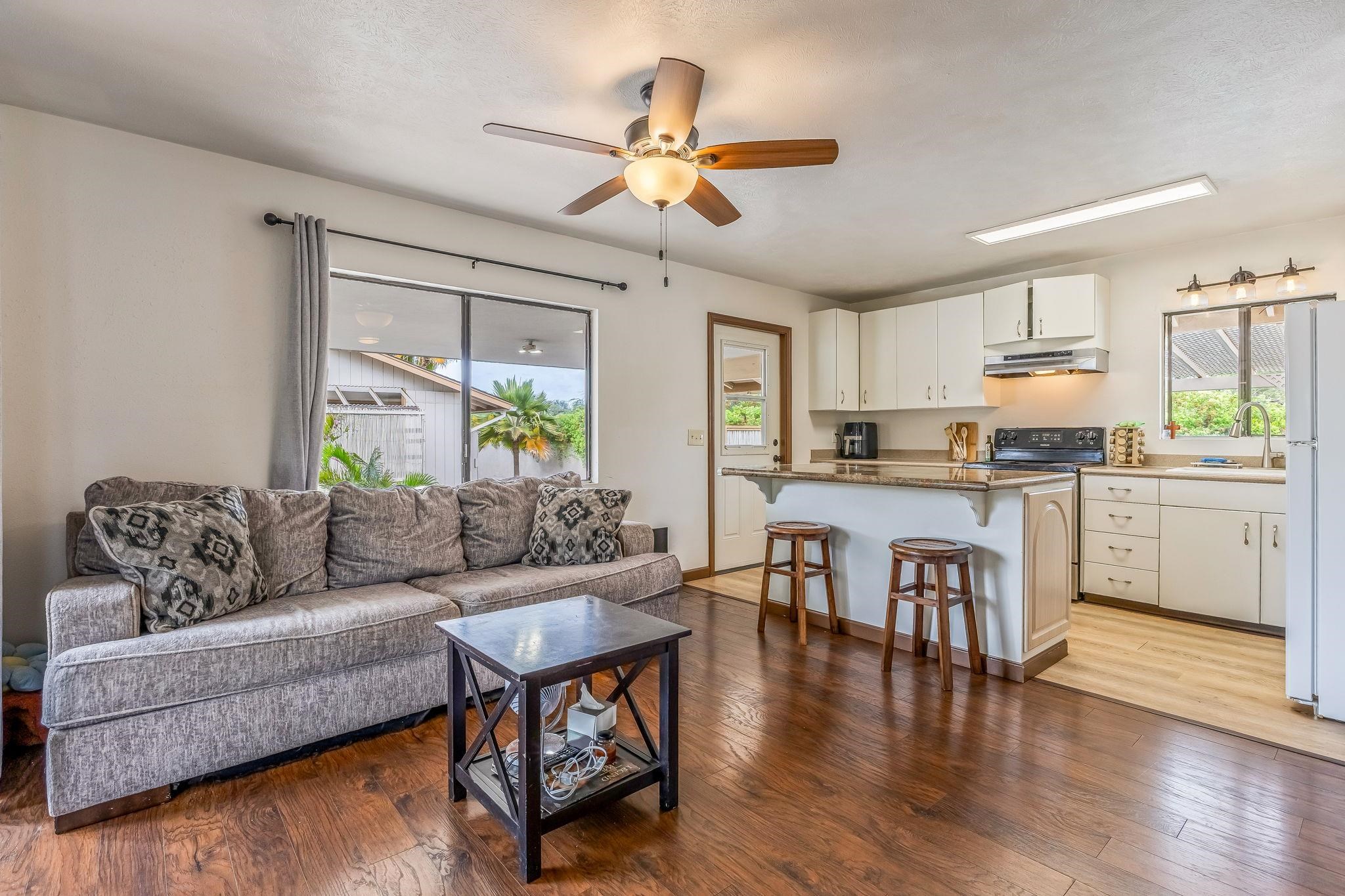 1156 South Kihei Road Kihei, HI 96753 - Photo 17 of 25 a living room with furniture and kitchen view