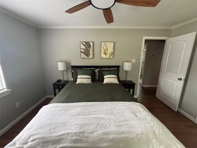a bedroom with a bed and furniture
