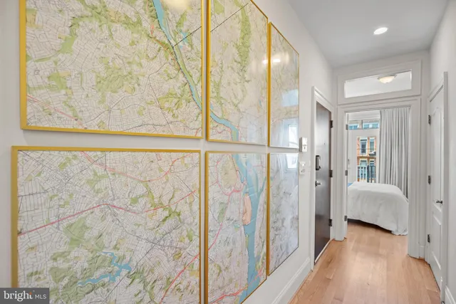 a view of bedroom with furniture and wooden floor