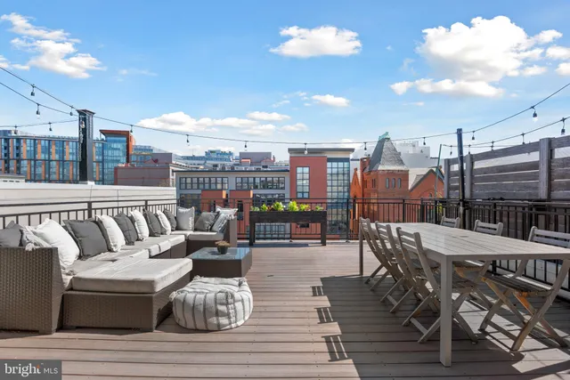 a view of a terrace with furniture