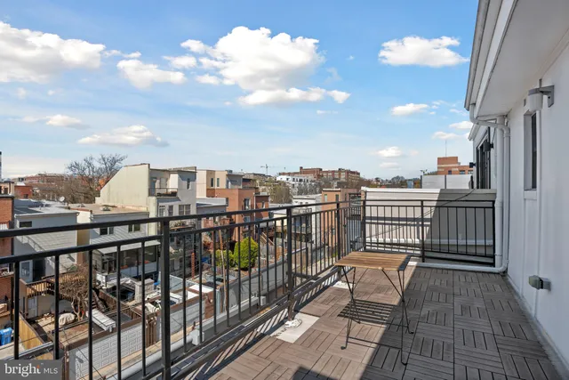 a view of city from a balcony