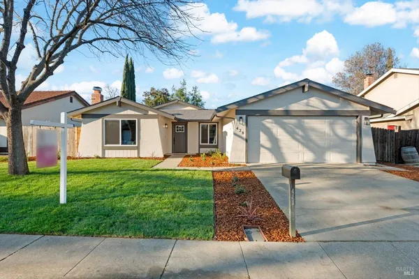a front view of a house with yard