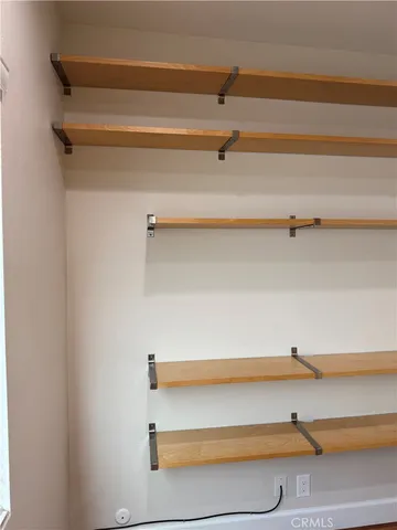 a view of a livingroom with wooden floor