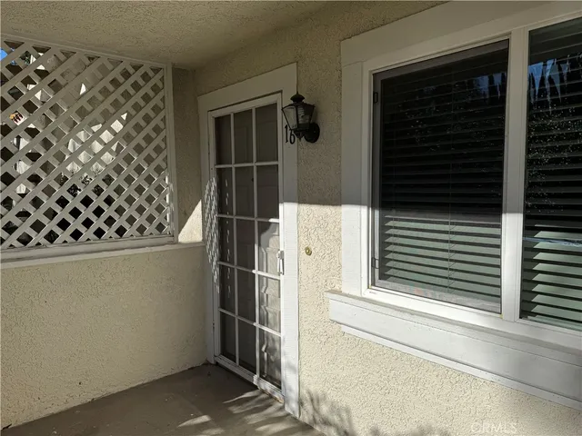 a view of a door and a chair