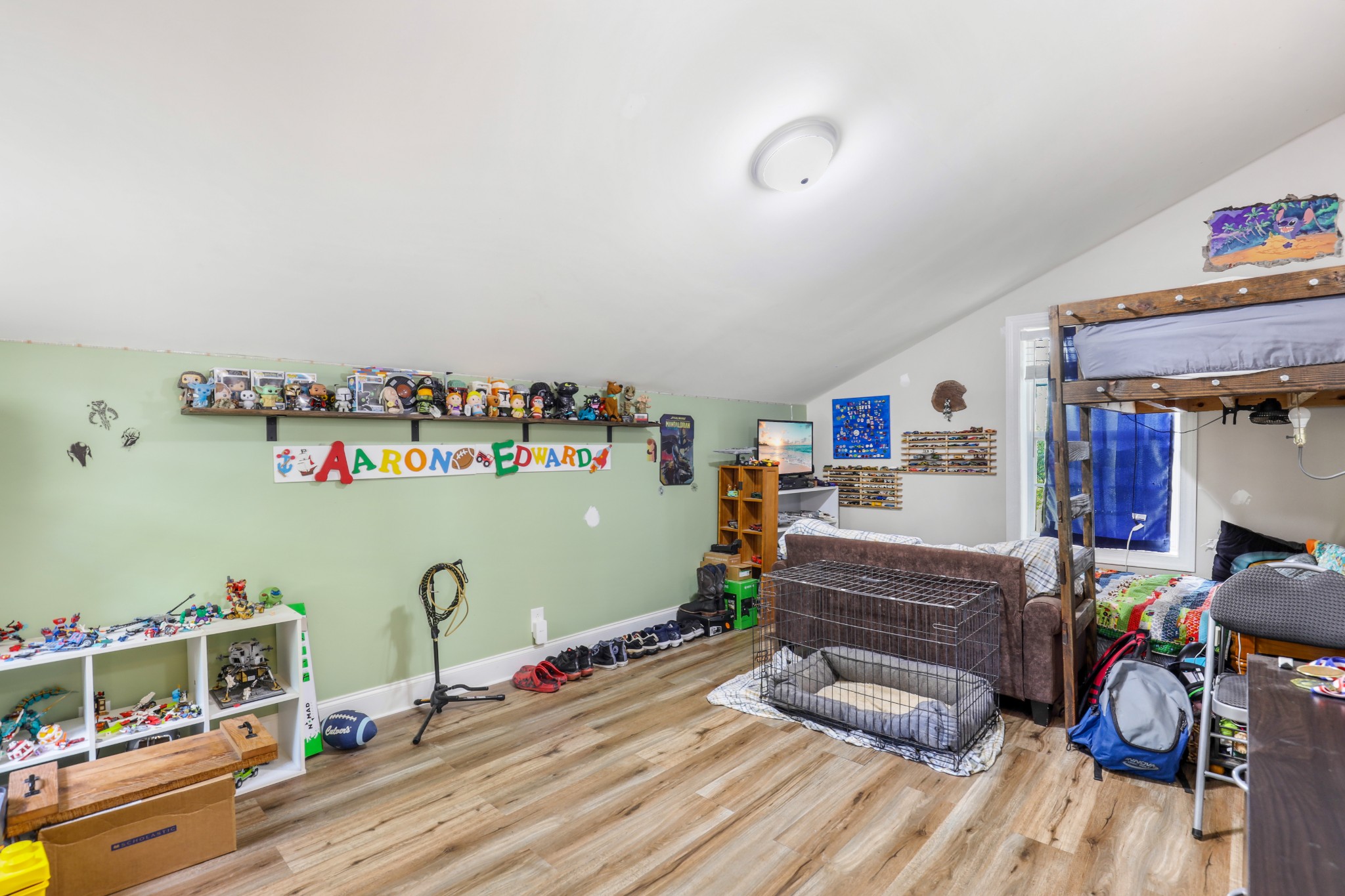 1073 Rector Lane Springfield, TN 37172 - Photo 23 of 25 a bedroom with furniture and a wooden floor