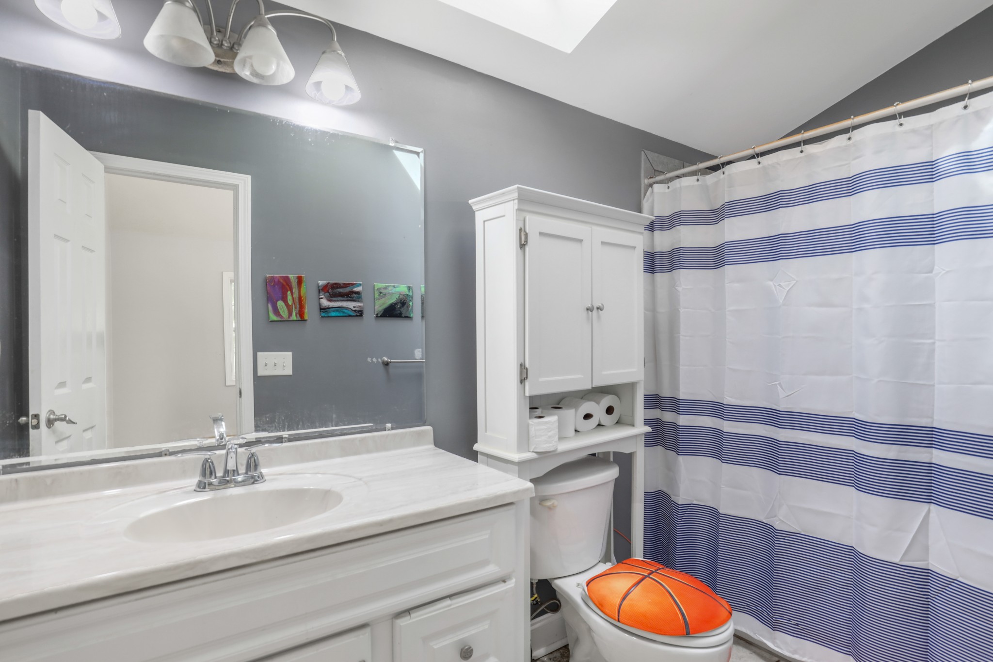 1073 Rector Lane Springfield, TN 37172 - Photo 24 of 25 a bathroom with a sink and a mirror