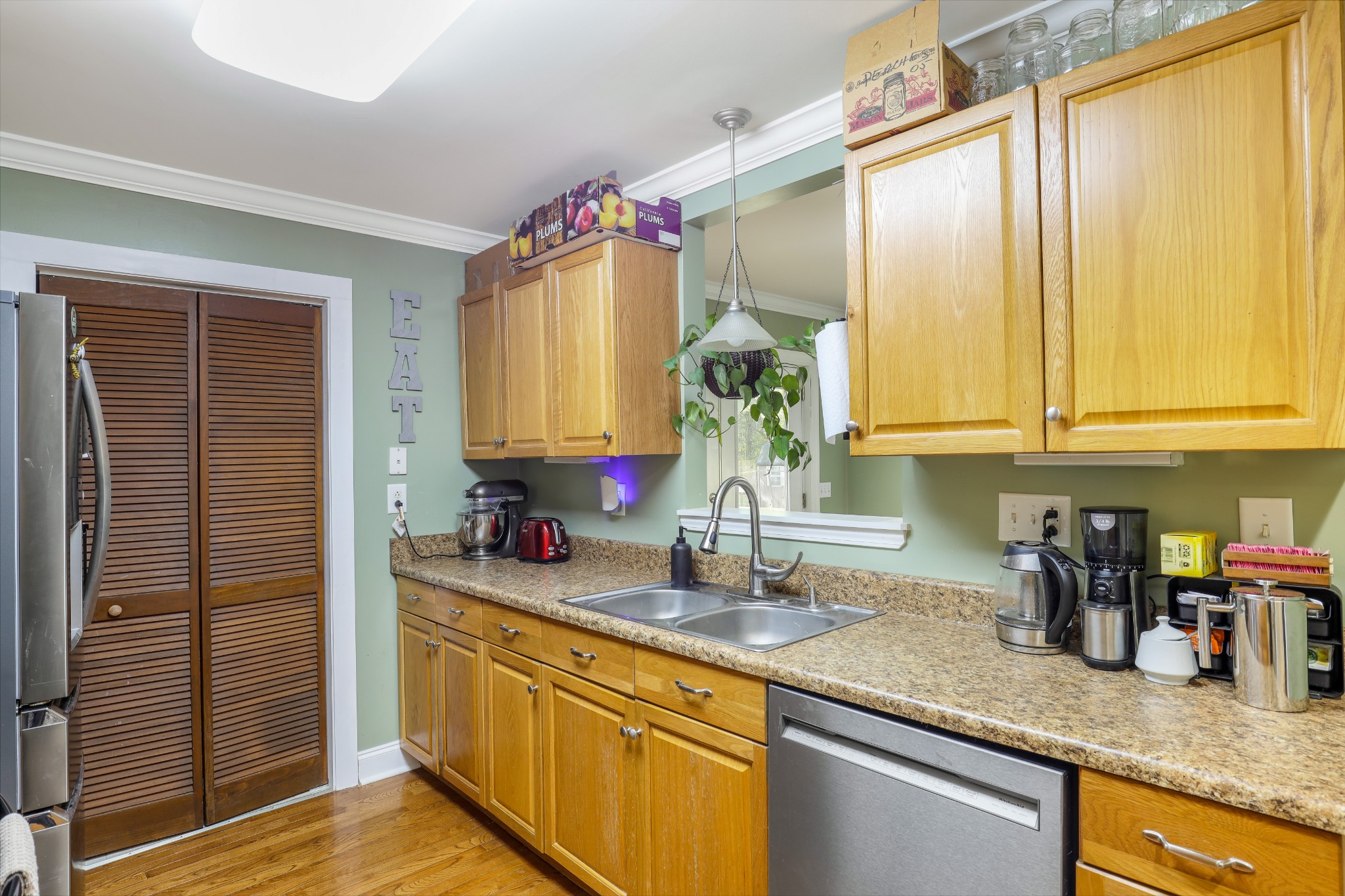 1073 Rector Lane Springfield, TN 37172 - Photo 10 of 25 a kitchen with stainless steel appliances granite countertop a sink and a window