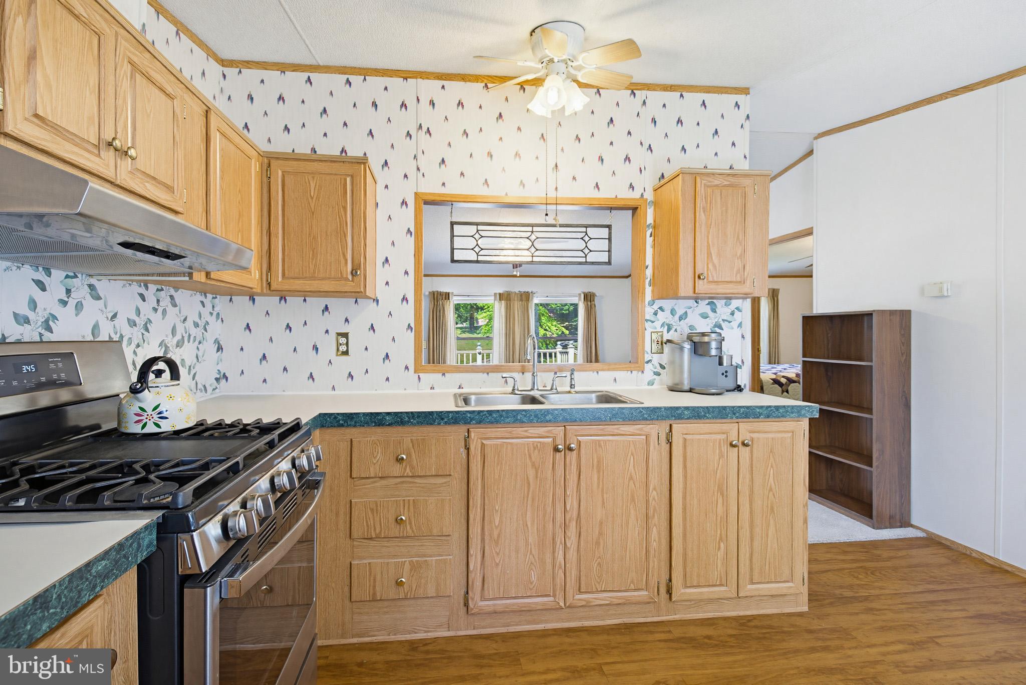 315 Lewis Road Annville, PA 17003 - Photo 4 of 33 a kitchen with granite countertop a stove and a sink