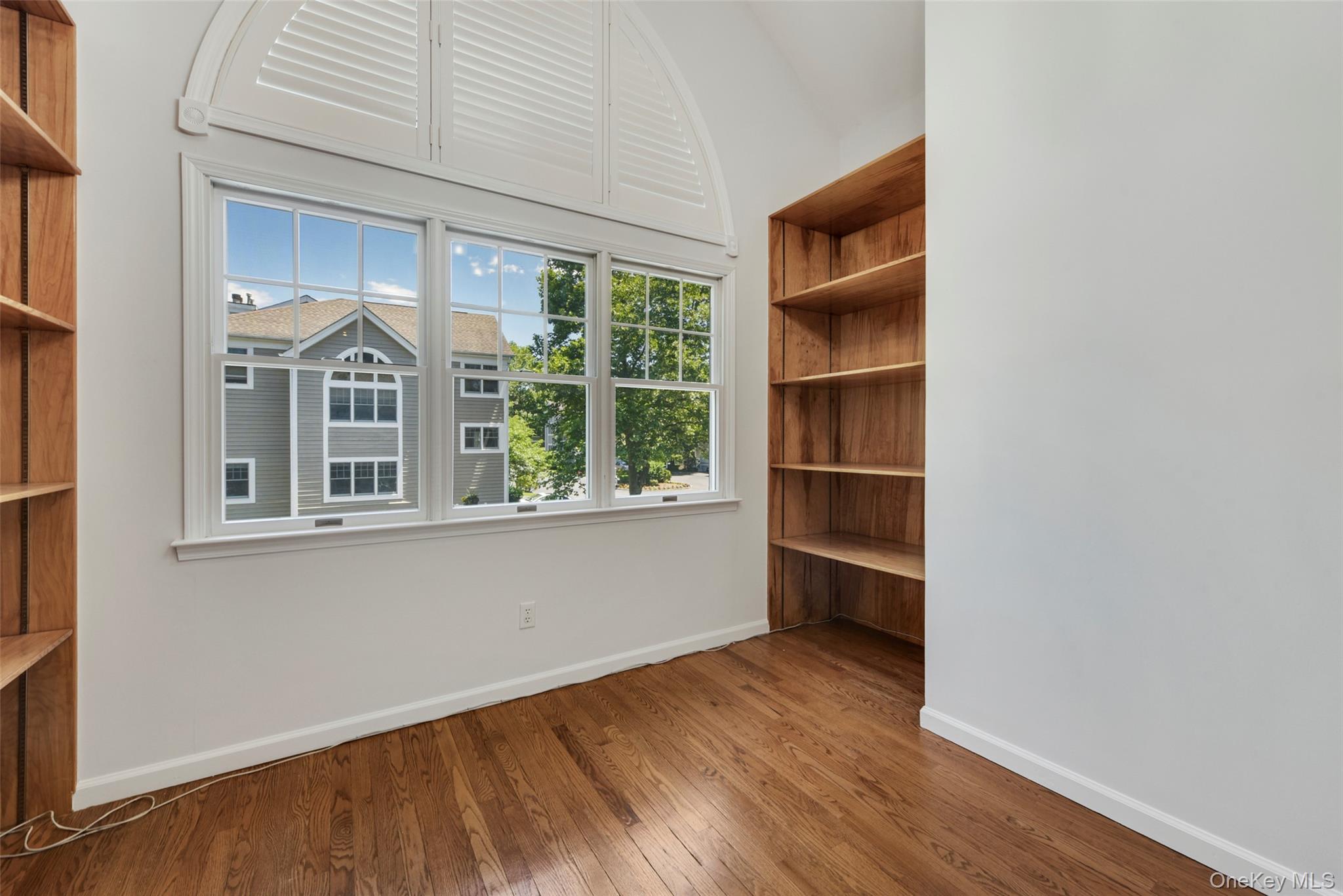 21 Brookridge Court Rye Brook, NY 10573 - Photo 12 of 20 Convenient nook at top of stairs with built-in bookshelves. Perfect for a desk, window seat, etc.