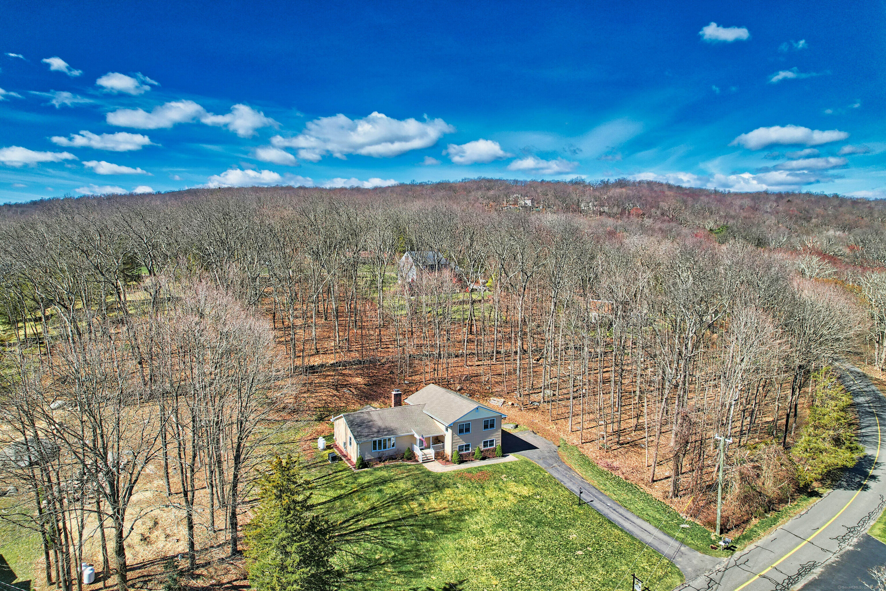 a view of a yard with a lake view