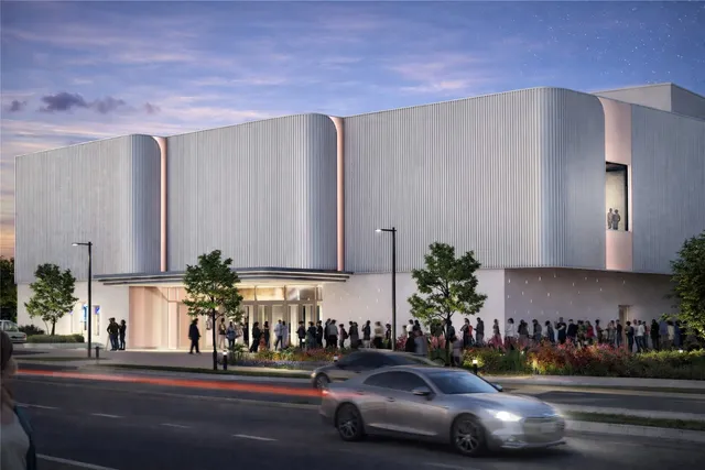 a view of a street with cars