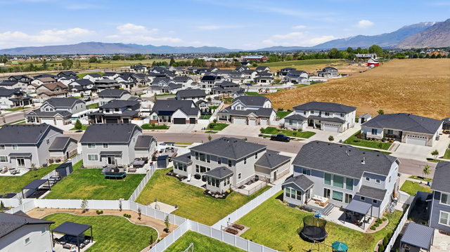 1165 West Union Bench Drive Mapleton, UT 84664 - Photo 51 of 61 Expansive residential neighborhood featuring numerous contemporary homes with dark shingle roofs and light-toned siding