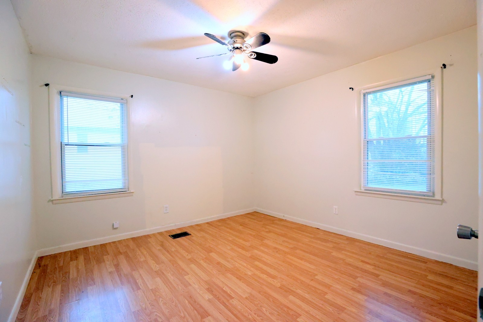 210 Rosenwald Street Trenton, KY 42286 - Photo 14 of 17 wooden floor in an empty room with a window