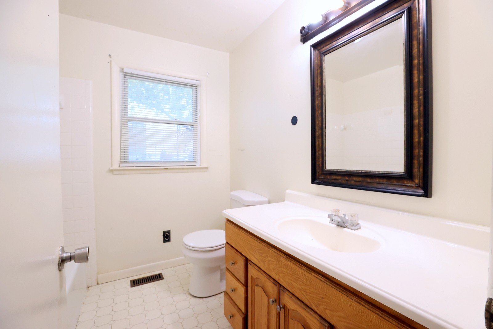 210 Rosenwald Street Trenton, KY 42286 - Photo 15 of 17 a bathroom with a sink and a mirror