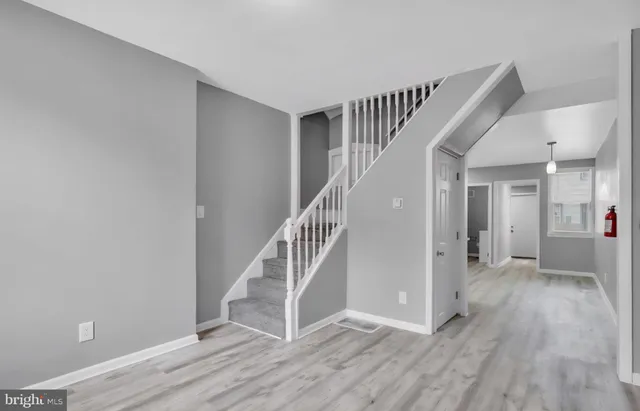 a view of entryway with wooden floor