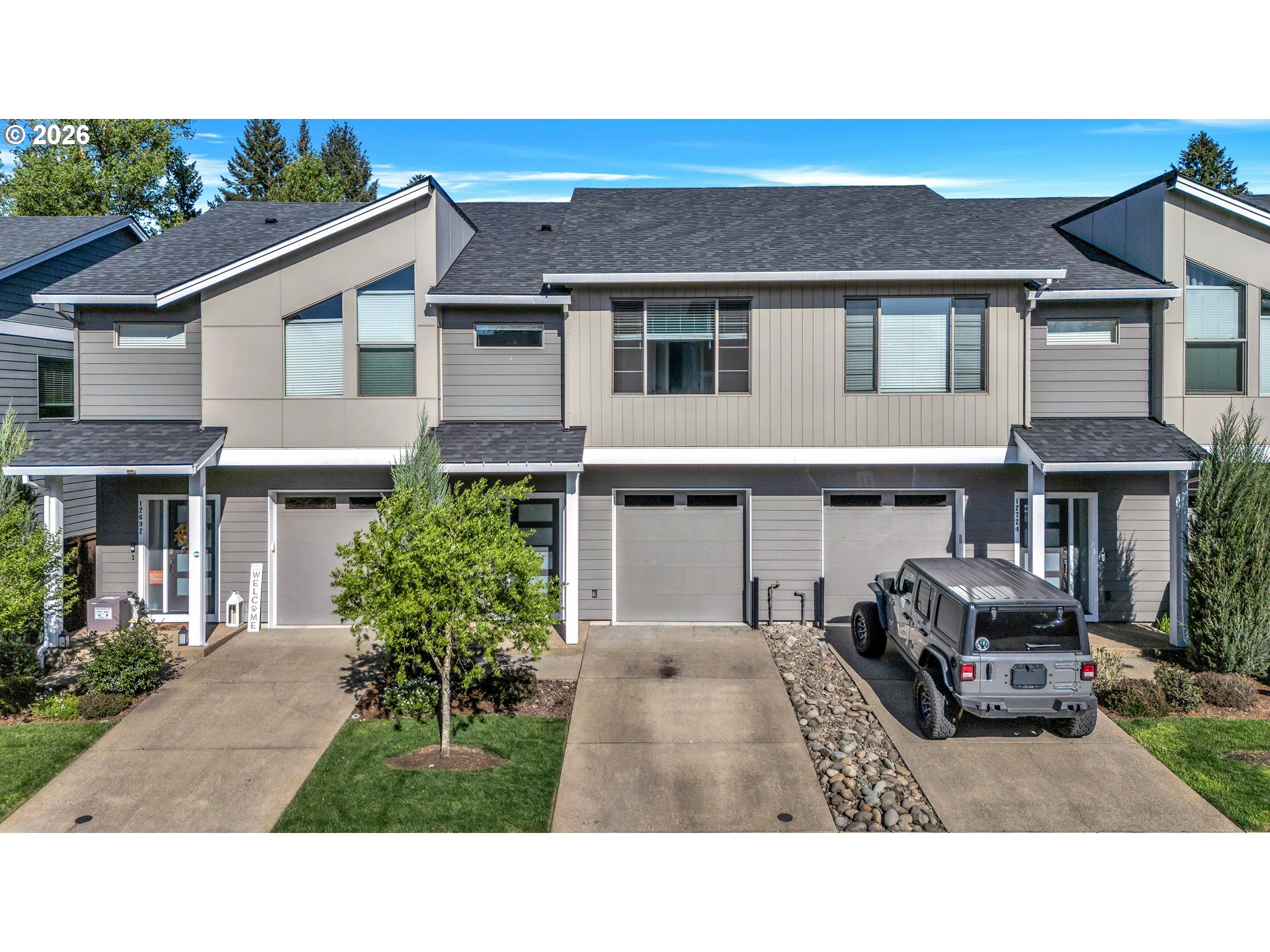 12706 Southeast Zion Street Boring, OR 97089 - Photo 1 of 34 a house view with a garden space